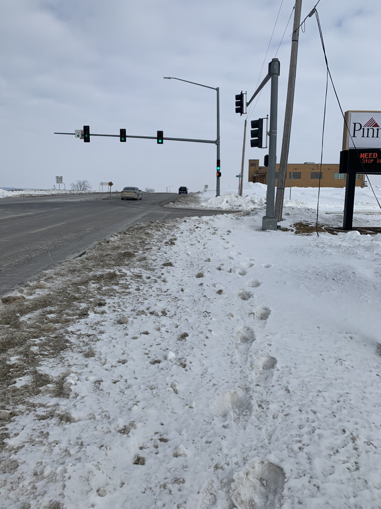 Sidewalk on US 63 at Summitt Street - Looking North